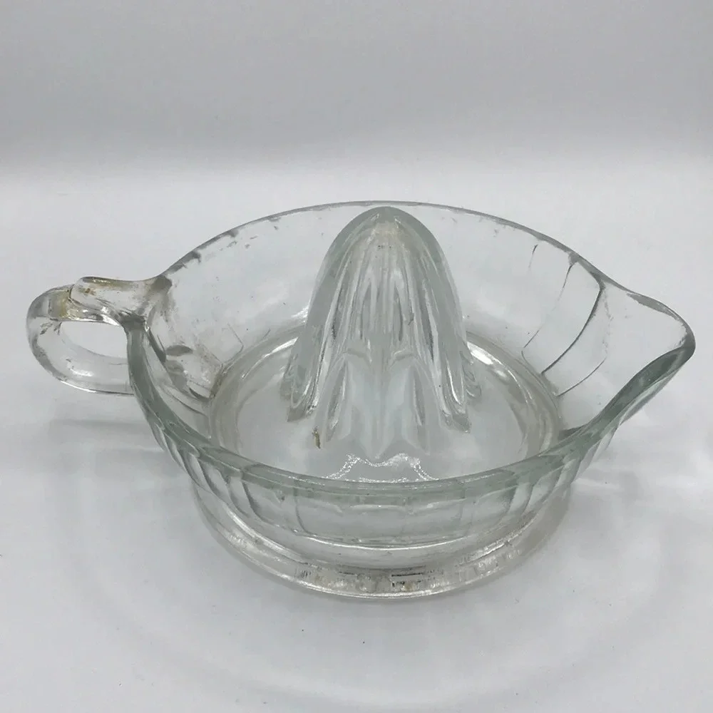 Vintage clear glass citrus juicer with spout